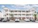 Three story condo building featuring brick facade, off-street parking and convenient exterior staircases at 1058 Sea Mountain Hwy. # 3-201, North Myrtle Beach, SC 29582