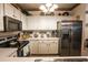 Modern kitchen featuring stainless steel appliances, bright white cabinetry, and granite countertops at 1058 Sea Mountain Hwy. # 3-201, North Myrtle Beach, SC 29582