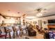 Open-concept living space with kitchen bar, casual seating, and inviting decor at 1058 Sea Mountain Hwy. # 3-201, North Myrtle Beach, SC 29582