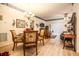 Dining area connected to a cozy living space with comfortable armchairs at 1058 Sea Mountain Hwy. # 3-201, North Myrtle Beach, SC 29582