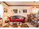 Comfortable living room with coastal decor, wood floors, a glass coffee table, and ample seating at 1058 Sea Mountain Hwy. # 3-201, North Myrtle Beach, SC 29582