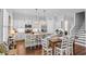Modern kitchen featuring white cabinets, stainless steel appliances, and an island with seating at 1106 Tarpon Pond Rd., North Myrtle Beach, SC 29582