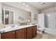 Bathroom featuring a single vanity, tile floors, and tub with shower at 1189 Wyatt Ln., Myrtle Beach, SC 29577