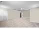 Large bedroom with neutral carpet, white trim, and a walk-in closet at 1189 Wyatt Ln., Myrtle Beach, SC 29577