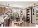 Cozy breakfast nook next to the kitchen, a perfect spot for casual dining and morning coffee at 1189 Wyatt Ln., Myrtle Beach, SC 29577