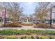 Downtown view of commercial buildings, fountains, and trees with green landscaping at 1189 Wyatt Ln., Myrtle Beach, SC 29577