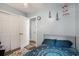 Bedroom with closet, adjacent room, and decorative wall art at 1205 King St., Myrtle Beach, SC 29577