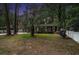 Exterior view of a brick home with a well-maintained lawn and a palm tree at 1205 King St., Myrtle Beach, SC 29577