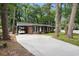 Charming brick ranch home with a long driveway and attached carport at 1205 King St., Myrtle Beach, SC 29577