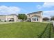 Lush backyard with plenty of room and a well-manicured lawn, perfect for outdoor activities at 1209 Eagle Creek Dr., Myrtle Beach, SC 29588