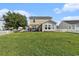 Beautiful backyard with a well-maintained lawn and a spacious patio for outdoor enjoyment at 1209 Eagle Creek Dr., Myrtle Beach, SC 29588