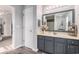 Charming bathroom with a vanity, decorative mirror, and an elegant neutral color scheme at 1209 Eagle Creek Dr., Myrtle Beach, SC 29588