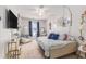 Inviting bedroom featuring carpet flooring, blue decor, ceiling fan, and natural light at 1209 Eagle Creek Dr., Myrtle Beach, SC 29588