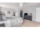 Spacious bedroom with neutral carpet, dark dresser, walk-in closet, and lots of light at 1209 Eagle Creek Dr., Myrtle Beach, SC 29588