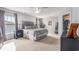 Spacious bedroom with neutral tones, carpet flooring, a large window, and closet at 1209 Eagle Creek Dr., Myrtle Beach, SC 29588