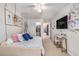 Inviting bedroom with carpet flooring, ceiling fan, TV, and blue accent decor at 1209 Eagle Creek Dr., Myrtle Beach, SC 29588