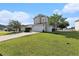 Inviting two-story home showcasing a manicured lawn and a two-car garage at 1209 Eagle Creek Dr., Myrtle Beach, SC 29588