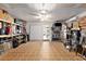 Spacious garage with ample storage, lighting, and a peek into the house interior at 1209 Eagle Creek Dr., Myrtle Beach, SC 29588