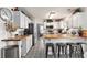 The kitchen features a butcher block island, stainless steel appliances, decorative tile flooring, and white cabinetry at 1209 Eagle Creek Dr., Myrtle Beach, SC 29588