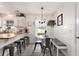 The kitchen features a breakfast nook, butcher block island, stainless steel appliances, decorative tile flooring, and white cabinetry at 1209 Eagle Creek Dr., Myrtle Beach, SC 29588