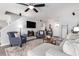 Bright and airy living room featuring a fireplace, plush seating, and ample natural light at 1209 Eagle Creek Dr., Myrtle Beach, SC 29588