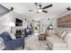 Well-lit living room with hardwood floors, modern furnishings, and cozy decor for relaxation at 1209 Eagle Creek Dr., Myrtle Beach, SC 29588