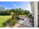 Outdoor patio features grill, lounge chairs, and green foliage at 142 Grier Crossing Dr., Conway, SC 29526