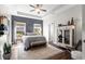 Spacious bedroom featuring a tray ceiling, a ceiling fan and natural lighting at 142 Grier Crossing Dr., Conway, SC 29526