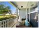 Inviting front porch with comfortable seating and views of the lush landscaping and neighborhood at 142 Grier Crossing Dr., Conway, SC 29526