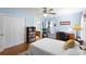 Cozy bedroom with a bed, built-in bookshelf, and adjacent bathroom access for added convenience at 1422 Baldwin Ct. # 1422, Little River, SC 29566