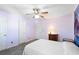 Bright, serene bedroom with neutral walls, carpet, and ceiling fan at 1422 Baldwin Ct. # 1422, Little River, SC 29566