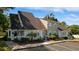 Exterior view showcasing the property's appealing facade and surrounding greenery at 1422 Baldwin Ct. # 1422, Little River, SC 29566
