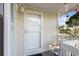 Inviting entrance featuring a secure screen door and charming porch decor at 1422 Baldwin Ct. # 1422, Little River, SC 29566