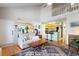 Open-concept living area with a view of the kitchen and loft, showcasing a modern and spacious design at 1422 Baldwin Ct. # 1422, Little River, SC 29566