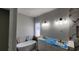 Elegant bathroom with a freestanding tub, double vanity, and marble accents at 1424 Hydrangea Dr., Myrtle Beach, SC 29579