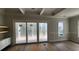 Spacious living room with a large sliding glass doors at 1424 Hydrangea Dr., Myrtle Beach, SC 29579