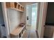 Bright mudroom features custom built-in storage and easy access to living spaces at 1424 Hydrangea Dr., Myrtle Beach, SC 29579