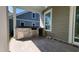 Covered outdoor kitchen with built-in grill and bar area at 1424 Hydrangea Dr., Myrtle Beach, SC 29579