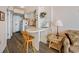 Efficient kitchenette equipped with appliances, counter seating, and beachy decor at 1501 Ocean Blvd. S # 103, North Myrtle Beach, SC 29582