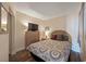 Comfortable bedroom with dresser, cozy queen bed, and soft decor at 1501 Ocean Blvd. S # 103, North Myrtle Beach, SC 29582