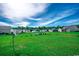 Large, green backyard showcasing the neighborhood at 176 Springtide Dr., Conway, SC 29527