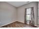Cozy bedroom with wood floors and natural light coming through the window at 176 Springtide Dr., Conway, SC 29527
