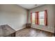 Bedroom with wood floors and a window with curtains at 176 Springtide Dr., Conway, SC 29527