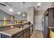 Functional kitchen with tiled backsplash, granite countertops, stainless appliances and ample counter space at 176 Springtide Dr., Conway, SC 29527