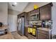 Modern kitchen with stainless steel appliances and granite countertops at 176 Springtide Dr., Conway, SC 29527