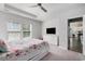 Bright bedroom with neutral carpet, a ceiling fan, and white dresser at 179 Empyrean Circle, Myrtle Beach, SC 29588