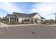 Inviting community clubhouse boasting modern architecture, lush landscaping, and ample parking at 179 Empyrean Circle, Myrtle Beach, SC 29588