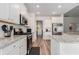 Well-equipped kitchen features stainless steel appliances and white cabinets at 179 Empyrean Circle, Myrtle Beach, SC 29588