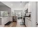 Modern kitchen with granite countertops, stainless steel appliances, and ample cabinet space at 179 Empyrean Circle, Myrtle Beach, SC 29588