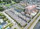 Overhead view showcases a community with a mix of housing and amenities like a tennis court, ponds, and golf course at 1801 N Ocean Blvd. # Q-2, North Myrtle Beach, SC 29582